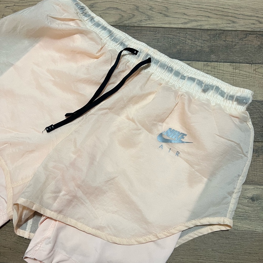 Peach Nike air running shorts